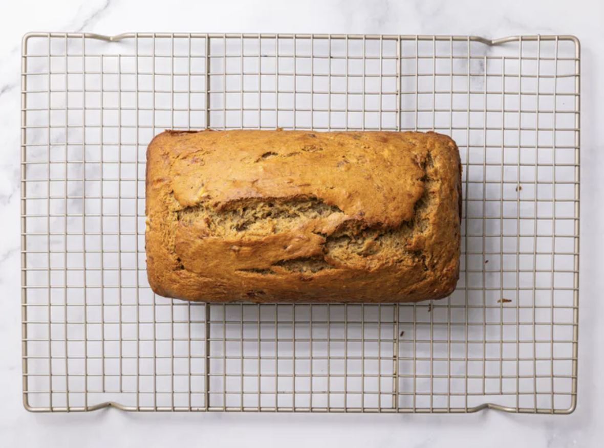 Banana bread cooling on a wire rack